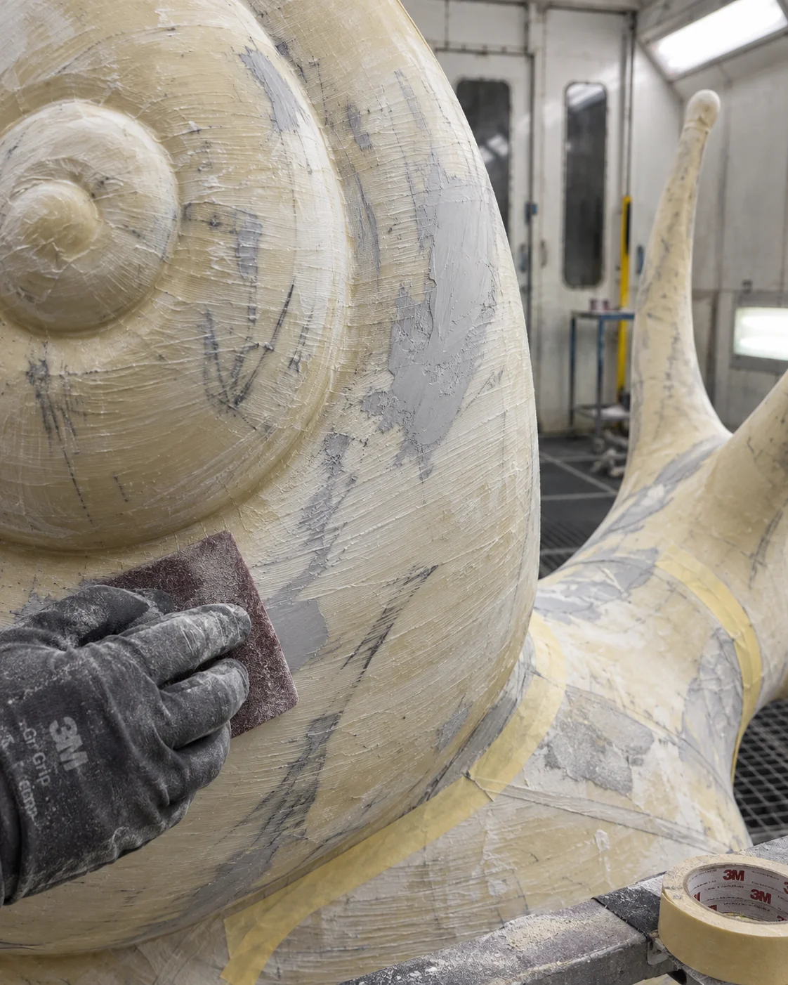 Sanding and surface preparation of the unfinished snail shell